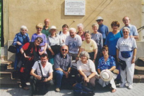 Canadian guests under the memorial plaque in P&eacute;cs.